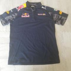 レッドブルの超かっこいいハーフジップのポロシャツUSサイズMです早い者勝ちです。 レッドブルの超かっこいいハーフジップのポロシャツUSサイズM