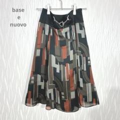 極美品 幾何学模様 フレアスカート チェーン付き スタイリッシュ 膝丈