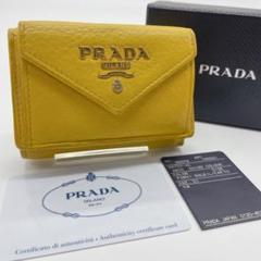 PRADA 三つ折り財布ペーパーミニウォレット 黄色【留め具不良あり】