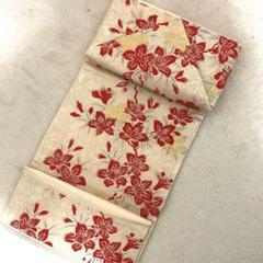 名古屋帯 ベージュ地に赤いお花 染