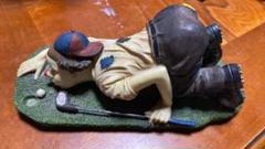 ゴルフをするピエロ 置物