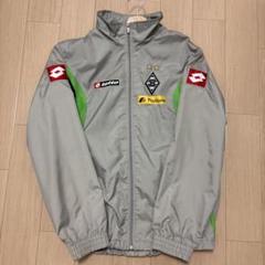 Lotto ピステ・ウィンドブレーカー グレー/グリーン 値下げ⭕️ Lotto ピステ・ウィンドブレーカー グレー/グリーン 値下げ