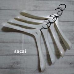 sacai サカイ トップスハンガー 12本セット 2025年最新】sacai 衣類ハンガーの人気アイテム - メルカリ