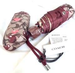 【新品】COACH 折りたたみ傘 チェリー柄 晴雨兼用 新品】COACH 折りたたみ傘 チェリー柄 晴雨兼用 - メルカリ