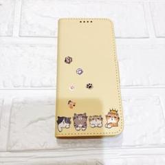 携帯ケース　手帳型　猫柄　黄色　イエロー