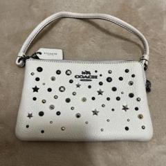 未使用COACH スタースタッズ ホワイトポーチ
