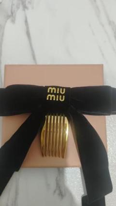 miu miu ヘアコーム付きリボン miu miu ゴールドヘアコーム リボン付き - メルカリ