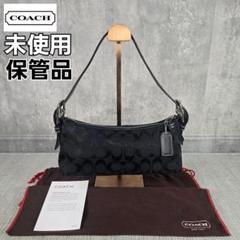 未使用　COACH　コーチ　ハンドバッグ　アクセサリーバッグ　シグネチャー　黒