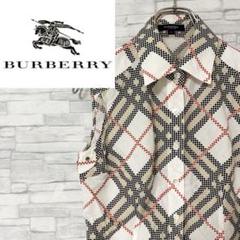 m6839【入手困難】Burberry's レトロベスト 金ボタン 9号 水色