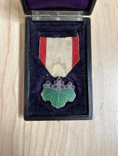 勲章 勲七等 青色桐葉