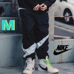 新品 レア NIKE トラックパンツ ”Big Swoosh” Mサイズ