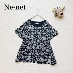【ネネット】半袖Tシャツ（フリー）総柄 フレア クルーネック 黒 カジュアル