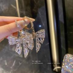 リボン ピアス ゴールド 【お洒落】レディース 目立つ キラキラ 揺れる