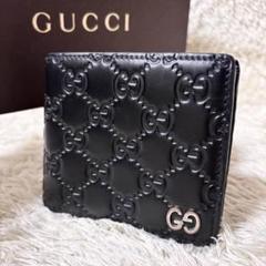 グッチ　超美品　長財布　GGシマレザー　リボン　ドリアン　エンボス　ロゴ　レザー 美品 グッチ シマレザー ドリアン 二つ折り財布 ブラック 金具