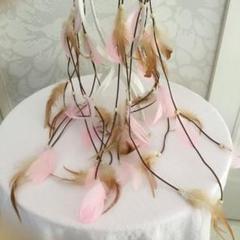 ピンクとブラウンの羽根ヘッドドレス