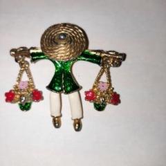 花売りのブローチ