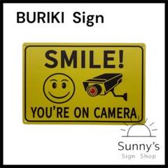 【Ag070】ブリキ看板　SMILE! YOU’RE ON CAMERA