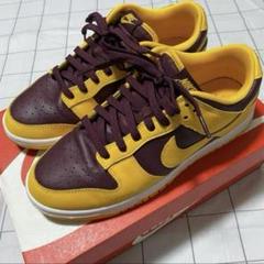 NIKE DUNK LOW RETRO “University Gold”