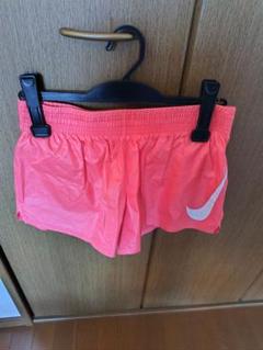 Nike オレンジ ショートパンツ