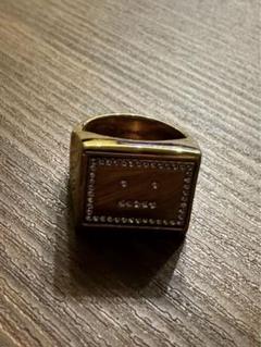 Acne studiousフェイスロゴ　リング　ゴールド アクネ ストゥディオズ - フェイス ロゴ リング | HBX - ハイプ