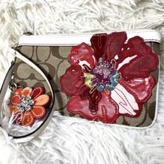【冬バーゲン★特別送料無料！】 COACH コーチ ポーチ 花柄 キーホルダー付き ハイビスカス バッグ