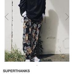 SUPERTHANKS スーパーサンクス 総柄 テーパードパンツ M メンズのサムネイル