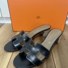 本日お値下げ　HERMES オアジス　ブラック　38 エルメス HERME サンダル オアジス 38 24cm ブラック 黒 - メルカリ