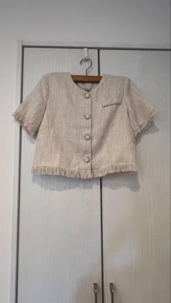 フリンジ付きベージュショートジャケット