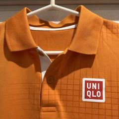 ユニクロロゴ　ポロシャツ　スポーツ　UNIQLO メンズ　オレンジ　東京