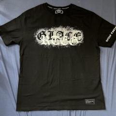 アダムスジャグラー ブラックTシャツ - メルカリ