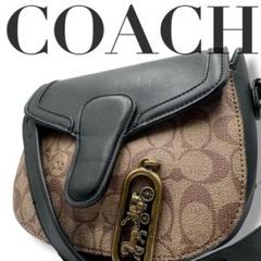 COACHコーチ ショルダーバッグ PVC ブラック ブラウン 馬車金具