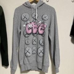 楽天市場】【COMME des GARCONS×KAWS】コムデギャルソン カウズ