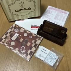 Q-pot】限定携帯 SH-04C docomo チョコレートビスケット - メルカリ