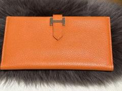 HERMÈS オレンジ 二つ折り財布