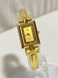 GIVENCHY ジバンシイQZ バングルウォッチ ゴールド文字盤 石付