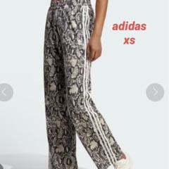 アディダスオリジナルス　パイソン柄パンツ adidas（アディダス）の「パイソン トラックパンツ / アディダス