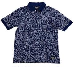 STUSSY ステューシー ロゴラベル スター×アロウ 総柄プリント ポロシャツ