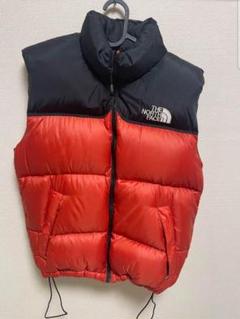 ノースフェイス ダウンベスト オレンジ赤　メンズ THE NORTH FACE（ダウンベスト ・ オレンジ/橙色系）のフリマ