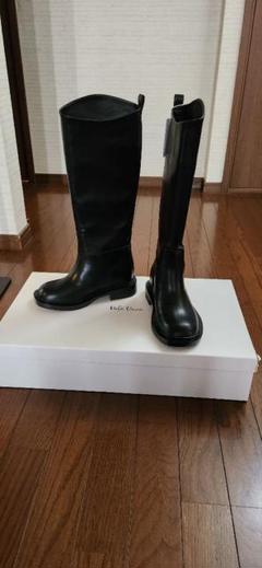 Mila Owen ロングブーツ 黒 ブラック Mila Owen（ミラオーウェン）の「トラックソールロングブーツ