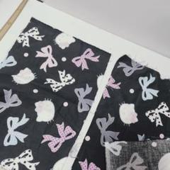 H 約35×24を２枚　綿　ハローキティリボンプリント生地　黒　平成レトロ