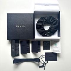 （R）PRADA  FOR SEA BEYOND Re-Nylonシュシュ PRADA プラダ FOR SEA BEYOND Re-Nylon シュシュ - メルカリ
