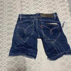 ジャングルキャットのデニム ショートパンツ