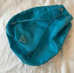 美品プラダpradaターコイズ巾着バッグポーチ 美品プラダpradaターコイズ巾着バッグポーチ - メルカリ