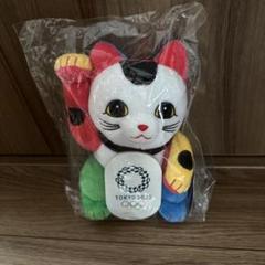 NBCの東京オリンピックの招き猫のピンバッジ アートを通して歴代のオリンピックの物語を伝えるプロジェクト