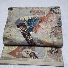 アンティーク丸帯　巻物と書籍に花の刺繍