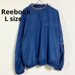 Reebok ナイロンVネックプルオーバーナイロンパイピングカーゴオーバーパンツ Reebok（リーボック）の「【Reebok別注】ナイロンパイピング