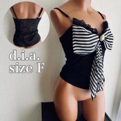 【希少】 d.i.a. 胸元リボン姫ギャル系背中開きトップス 希少】 d.i.a. 胸元リボン姫ギャル系背中開きトップス - メルカリ