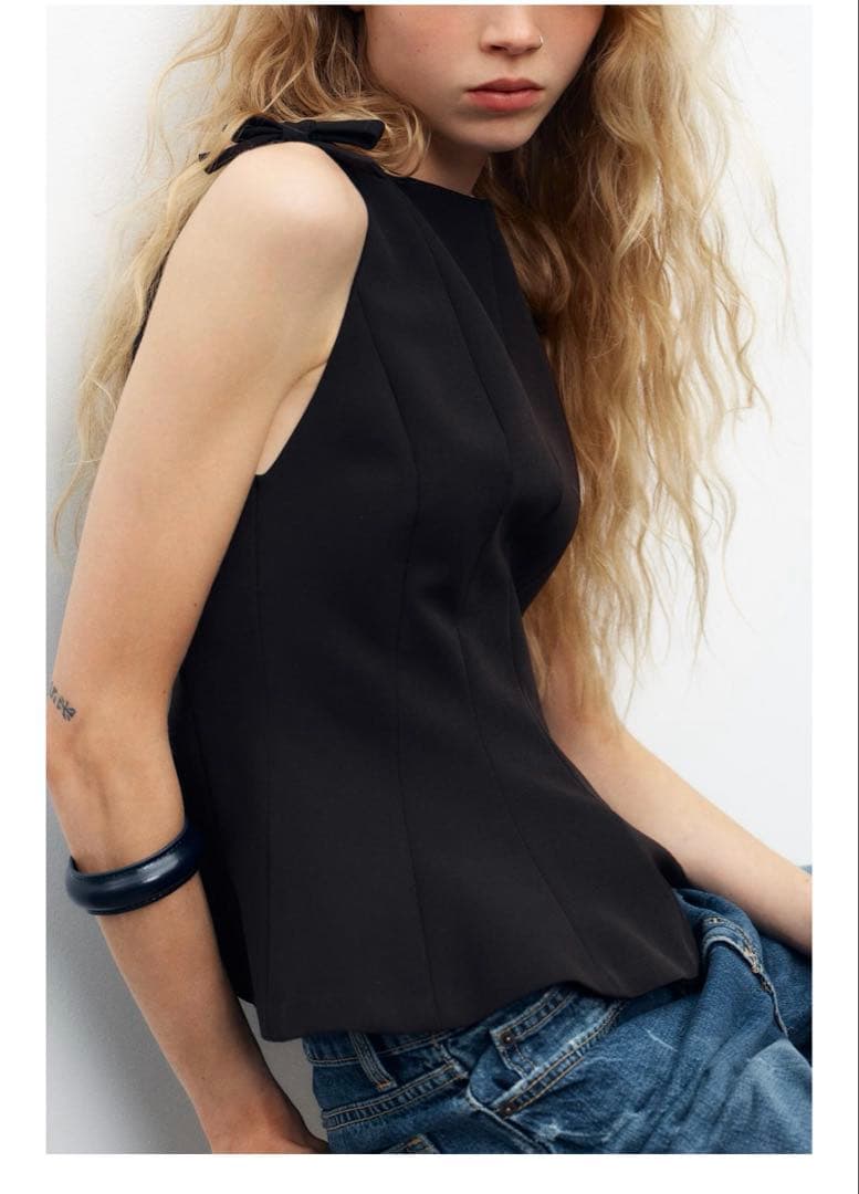 新品タグ付き未使用♡ZARA♡ペプラムリボントップス黒Mサイズ