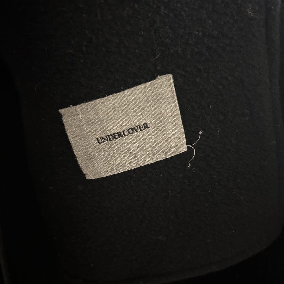 UNDER COVER