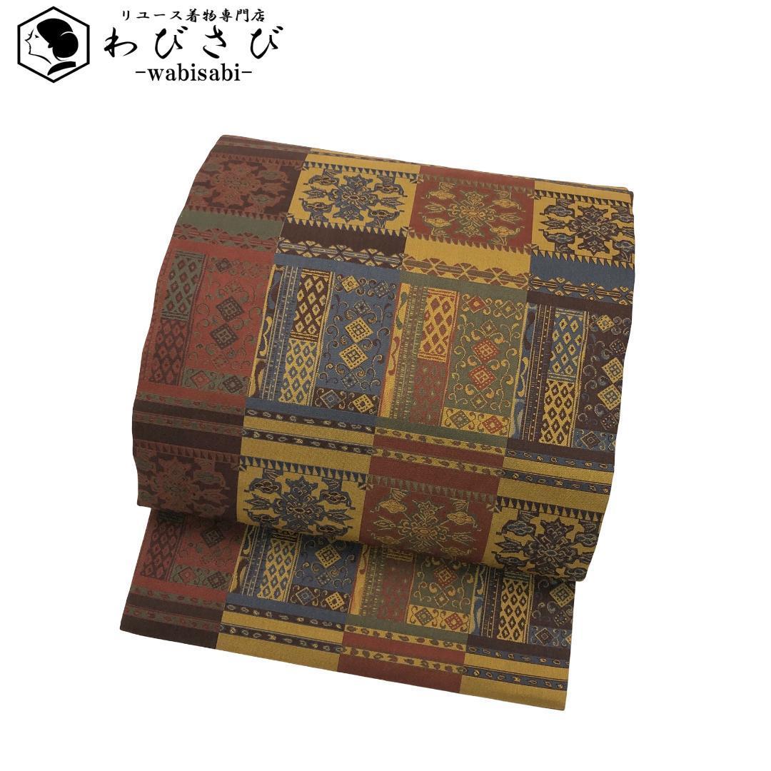 名古屋帯 四角に華柄模様 黄土色 O-5581目立った傷や汚れなし